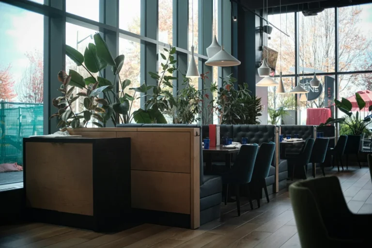 Modern restaurant seating with indoor plants